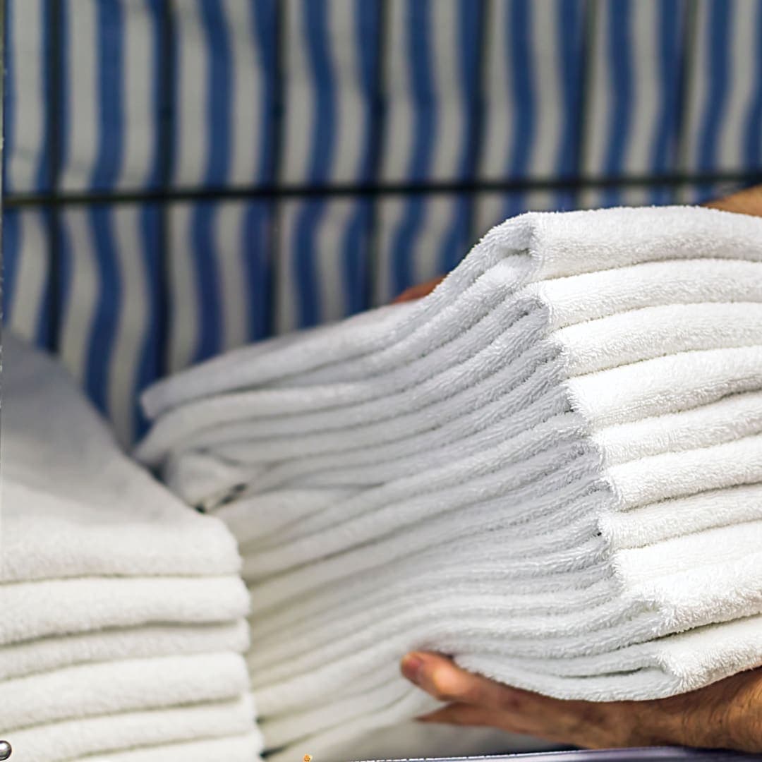A neatly folded stack of towels